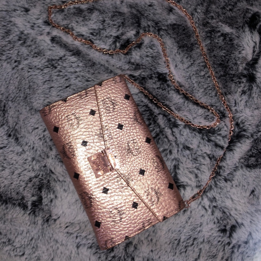 Rose gold MCM clutch/wallet bag